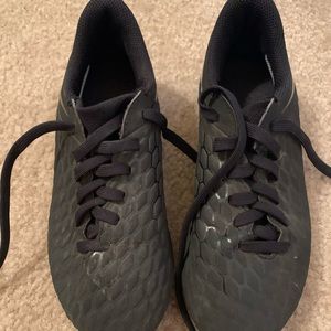 All black Nike youth soccer cleats size 11